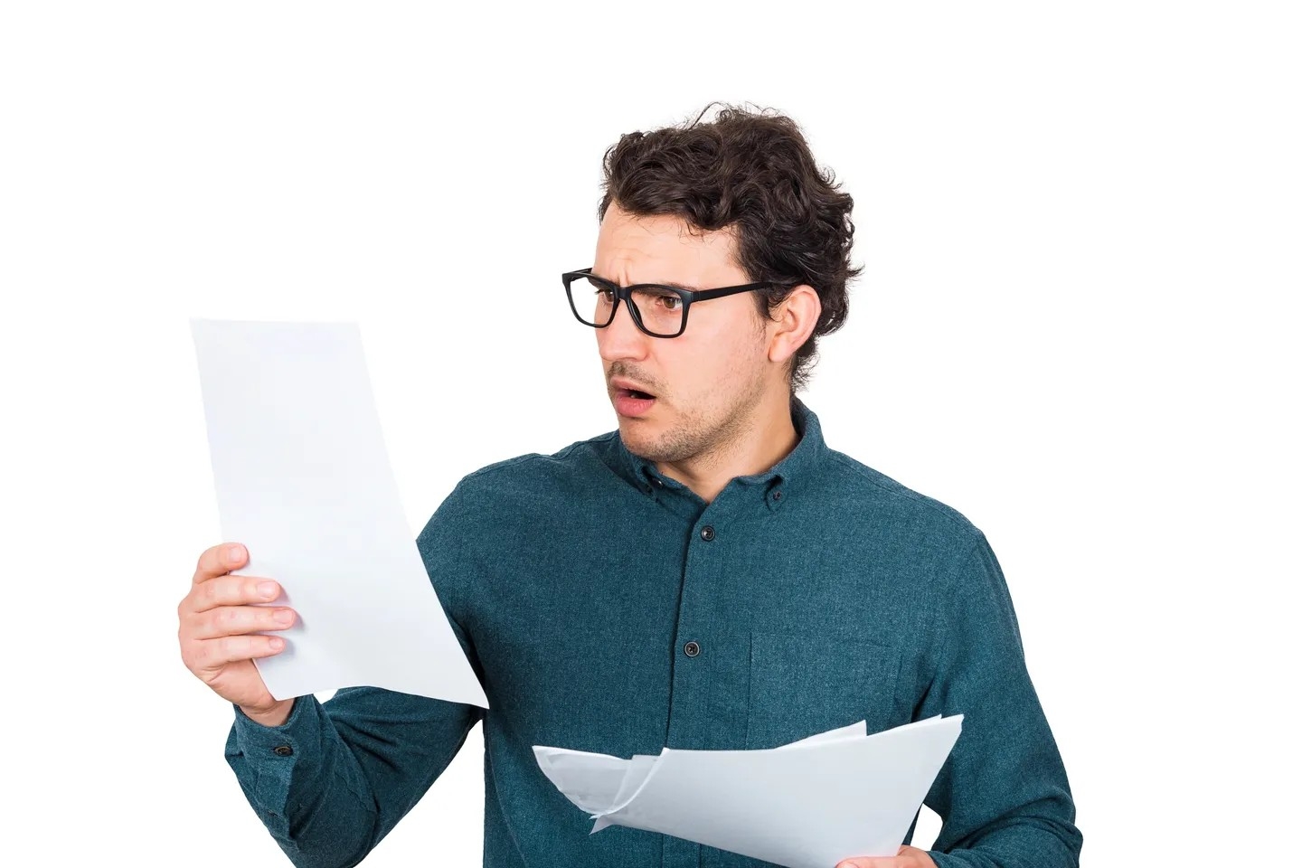 Man looking surprised at a document